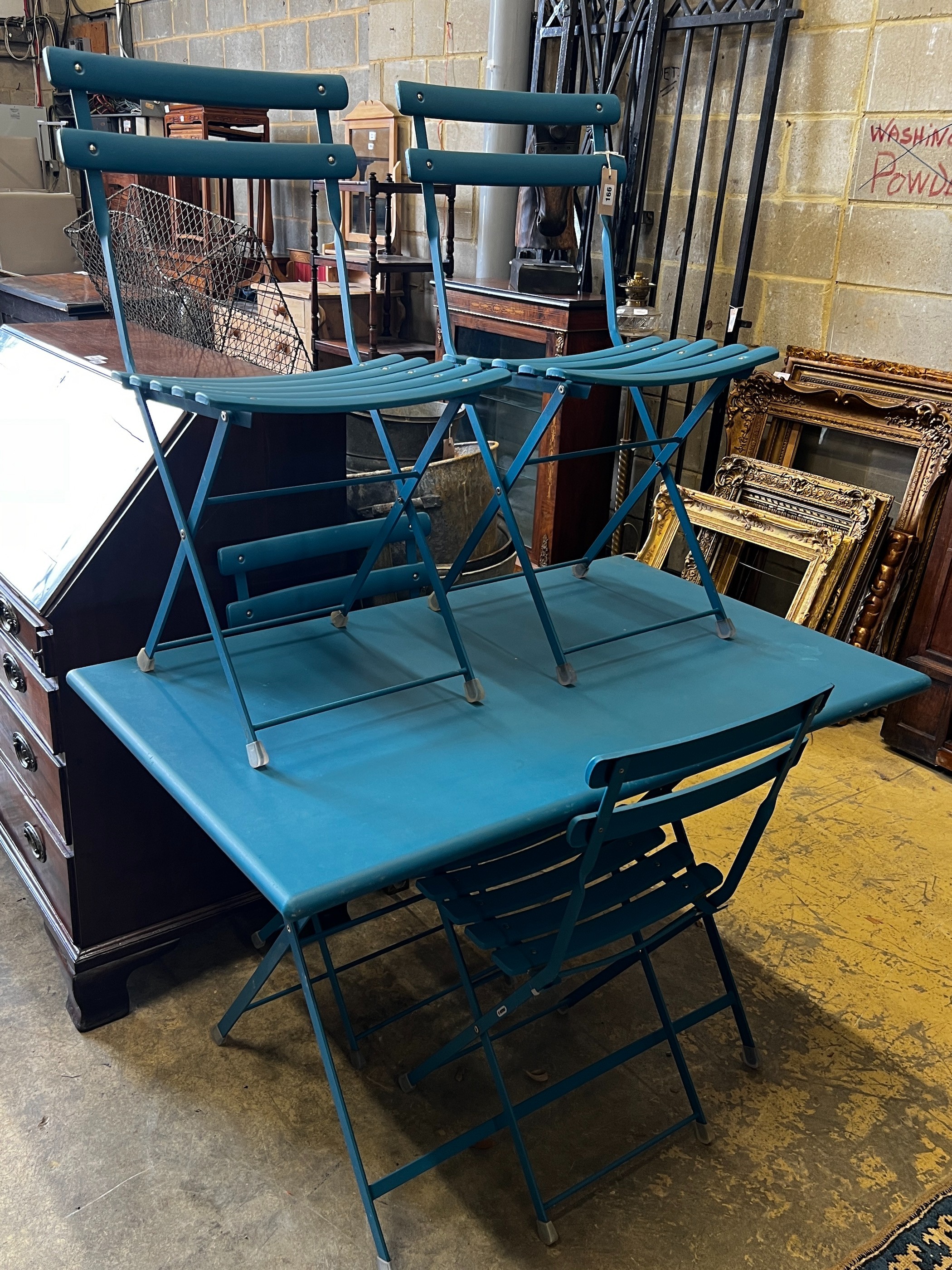 EMU furniture - A rectangular folding garden table, length 110cm, depth 69cm, height 73cm and four chairs